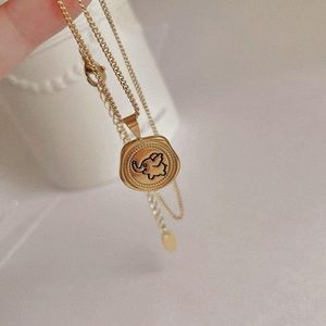 Gold elephant necklace